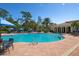 Enjoy this refreshing pool area with plenty of seating and tables at 115 Avalini Way, North Venice, FL 34275