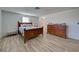 Bedroom with a double bed and wooden dresser at 1358 Leawood Rd, Englewood, FL 34223