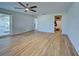 Spacious bedroom featuring hardwood floors and a ceiling fan at 1358 Leawood Rd, Englewood, FL 34223
