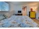 Bedroom with queen-size bed and walk-in closet at 1358 Leawood Rd, Englewood, FL 34223
