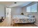 Bedroom with a queen-size bed and access to bathroom at 1358 Leawood Rd, Englewood, FL 34223