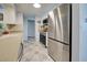 Kitchen with stainless steel refrigerator at 1358 Leawood Rd, Englewood, FL 34223