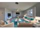 Virtually staged living room with comfy seating at 1358 Leawood Rd, Englewood, FL 34223