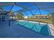 Refreshing screened-in pool and patio area at 1358 Leawood Rd, Englewood, FL 34223