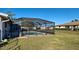 Inviting screened-in pool with large backyard at 1358 Leawood Rd, Englewood, FL 34223