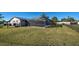 Screened-in pool with spacious backyard at 1358 Leawood Rd, Englewood, FL 34223
