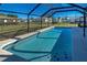 Enjoy this large, screened-in pool area at 1358 Leawood Rd, Englewood, FL 34223