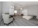 Spacious living room with sectional sofa and light gray walls at 1363 Brookside Dr, Venice, FL 34285