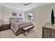 Spacious bedroom with large window and modern dresser at 17108 Vardon Ter # 308, Bradenton, FL 34211