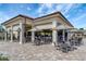 Outdoor bar and patio seating area at 17108 Vardon Ter # 308, Bradenton, FL 34211