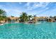 Stunning pool with waterfalls and lounge area at 17108 Vardon Ter # 308, Bradenton, FL 34211