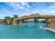 Relaxing pool area with a unique rock feature at 17108 Vardon Ter # 308, Bradenton, FL 34211