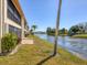 Waterfront property with canal view and lush landscaping at 1743 Lake Pl # 1743B, Venice, FL 34293