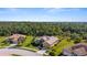 Stunning aerial view showcasing the home's private setting and neighborhood at 19718 Cobblestone Cir, Venice, FL 34292