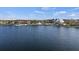 Calm lake with community clubhouse at 19718 Cobblestone Cir, Venice, FL 34292