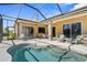 Enjoy this lovely screened-in pool and patio area at 19718 Cobblestone Cir, Venice, FL 34292