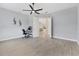 Bright home office with wood-look floors and view to living area at 20909 Duomo Ct, Venice, FL 34293