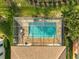 Overhead view of refreshing pool with screened enclosure at 232 Benedetto Ct, Nokomis, FL 34275