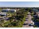 Neighborhood street with lush landscaping and homes at 232 Benedetto Ct, Nokomis, FL 34275