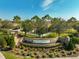 Milano community entrance with landscaping and fountain at 232 Benedetto Ct, Nokomis, FL 34275