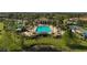 Resort-style pool, spa, and clubhouse in community at 232 Benedetto Ct, Nokomis, FL 34275