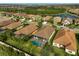 Aerial view of community, highlighting homes and landscape at 232 Benedetto Ct, Nokomis, FL 34275