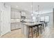Modern kitchen with granite countertops and stainless steel appliances at 232 Benedetto Ct, Nokomis, FL 34275