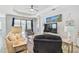 Relaxing living room with comfortable seating and backyard access at 232 Benedetto Ct, Nokomis, FL 34275