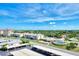Aerial view of community, showing building, parking and landscaping at 255 The Esplanade N # 603, Venice, FL 34285