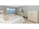 Guest bedroom with two twin beds, ocean view, and ample closet space at 255 The Esplanade N # 603, Venice, FL 34285
