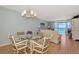 Dining area with glass table and ocean views at 255 The Esplanade N # 603, Venice, FL 34285