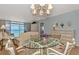 Bright dining area with glass-top table and ocean view at 255 The Esplanade N # 603, Venice, FL 34285