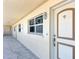 Building hallway with light-colored walls and doors at 255 The Esplanade N # 603, Venice, FL 34285
