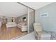 Bright living room with light flooring and comfy furniture, sliders to balcony at 255 The Esplanade N # 603, Venice, FL 34285