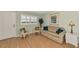 Living room with sofa, chairs, and hardwood floors at 255 The Esplanade N # 603, Venice, FL 34285