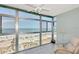Stunning ocean view from sunroom with comfy seating at 255 The Esplanade N # 603, Venice, FL 34285