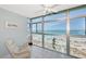 Relaxing ocean view from sunroom, featuring comfortable seating at 255 The Esplanade N # 603, Venice, FL 34285