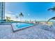 Inviting pool area with lounge chairs and ocean views at 255 The Esplanade N # 603, Venice, FL 34285