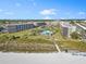 Aerial view of community near beach with pool and lush landscaping at 5790 Midnight Pass Rd # 602, Sarasota, FL 34242