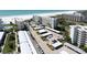 Aerial view of coastal condo complex with pool, pond, and parking at 5790 Midnight Pass Rd # 602, Sarasota, FL 34242