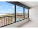 Spacious balcony overlooking the ocean and pool at 5790 Midnight Pass Rd # 602, Sarasota, FL 34242