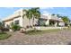 Community clubhouse with landscaped grounds at 5790 Midnight Pass Rd # 602, Sarasota, FL 34242