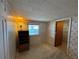 Secondary bedroom with a window and built-in shelving at 611 50Th Avenue W Dr, Bradenton, FL 34207