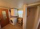 Convenient laundry room with washer, dryer, and extra storage at 611 50Th Avenue W Dr, Bradenton, FL 34207