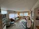 Cozy living room featuring wicker furniture and a comfortable seating area at 611 50Th Avenue W Dr, Bradenton, FL 34207