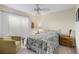 Serene bedroom with a double bed and an ensuite bath at 704 Harrington Lake S Dr # 6, Venice, FL 34293
