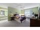 Cozy bedroom with a charming antique bed and dresser at 704 Harrington Lake S Dr # 6, Venice, FL 34293