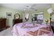Spacious bedroom with a queen-size bed and mirrored closet at 704 Harrington Lake S Dr # 6, Venice, FL 34293
