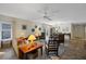 Bright living room featuring tiled floors and comfy seating at 704 Harrington Lake S Dr # 6, Venice, FL 34293