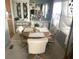 Bright dining room with octagonal table and seating for four at 727 Blackburn Blvd, North Port, FL 34287